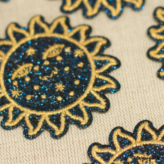 Ecusson Glitter plein soleil 61 mm