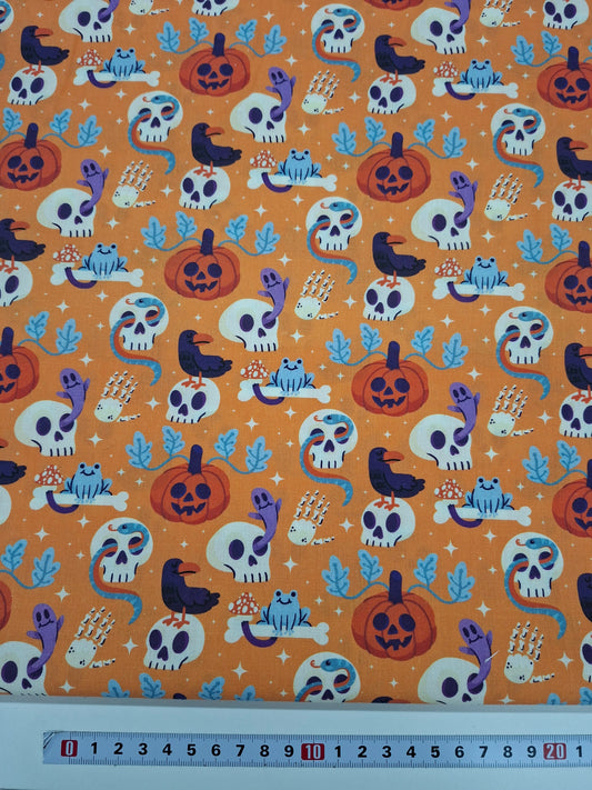 Tissu coton Halloween orange - vendu par 50 cm