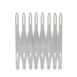 Jauge extensible pour espacer les boutonnières