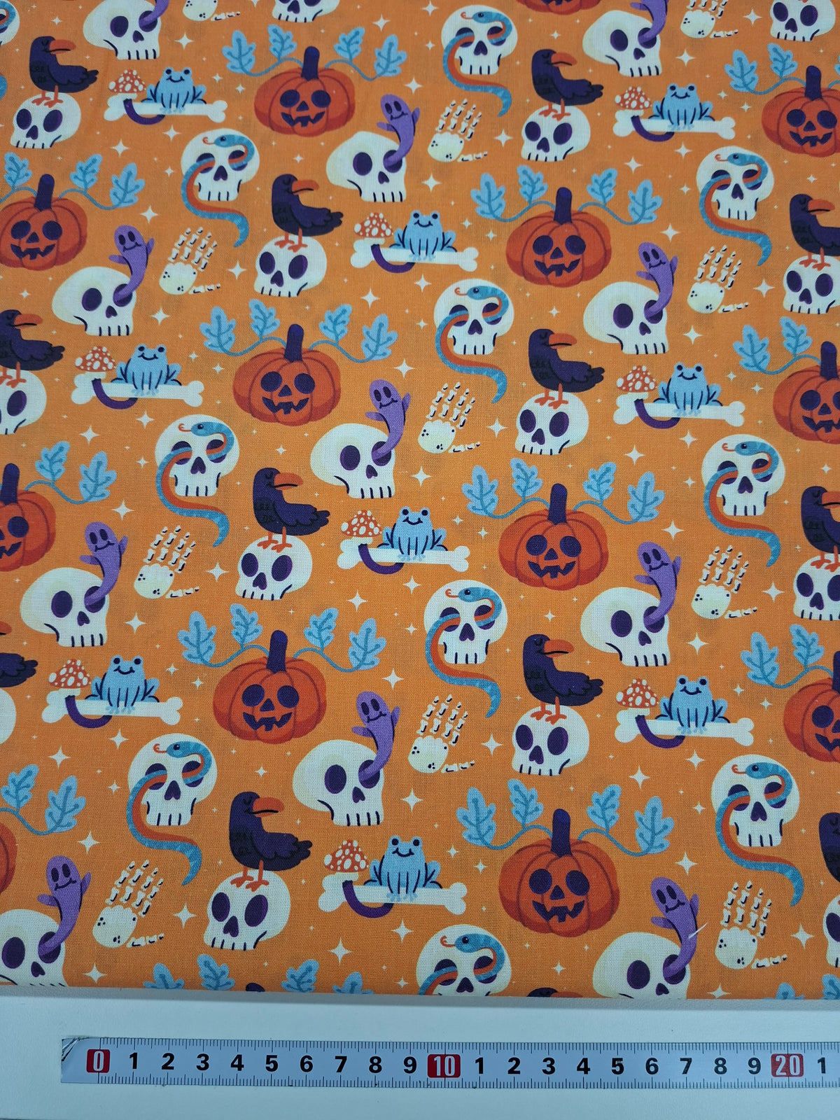 Tissu coton Halloween orange - vendu par 50 cm