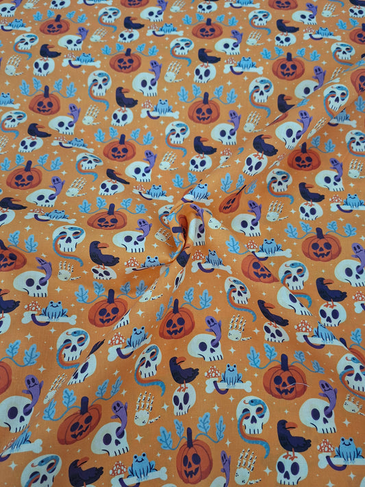 Tissu coton Halloween orange - vendu par 50 cm